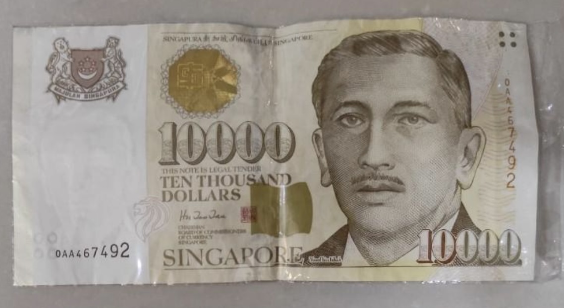 Singapore & Indonesia police catch counterfeiters after fake S$10,000 notes were spotted at casino